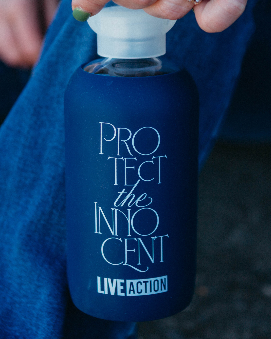 Protect The Innocent Glass Water Bottle